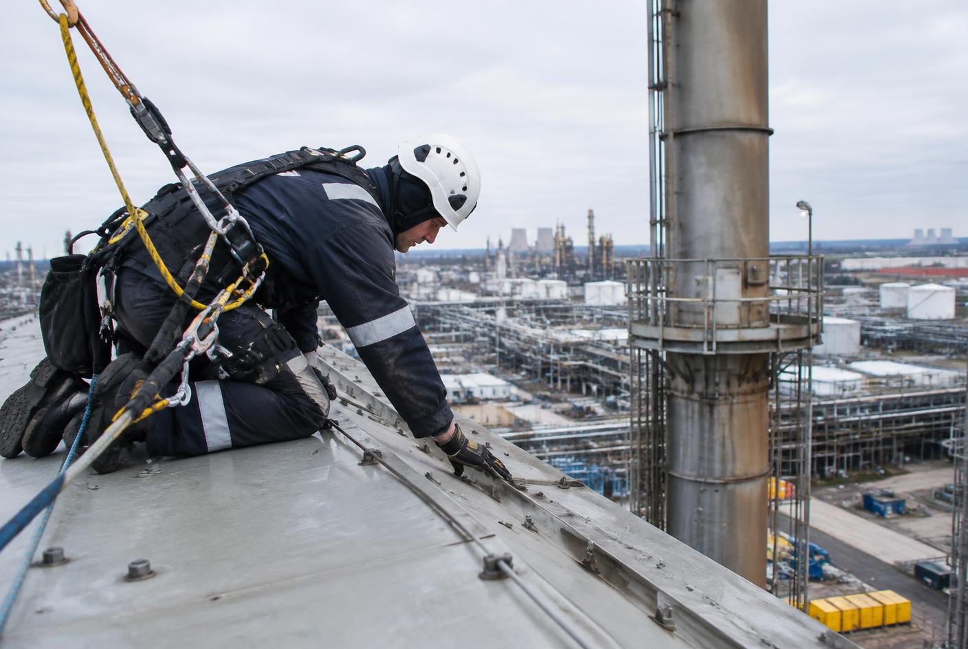 Rope-access technician carrying out structural work during a plant turnaround